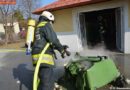 Mö: Passanten ziehen brennenden Müllbehälter aus einem Gebäude