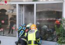 T:  Brand in einem Modegeschäft
